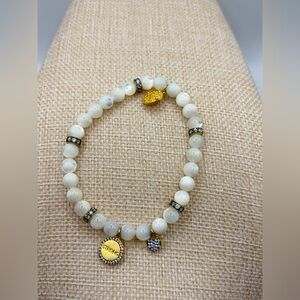 New never worn Freida Rothman Stretch Elegant White and Gold Beaded Bracelet